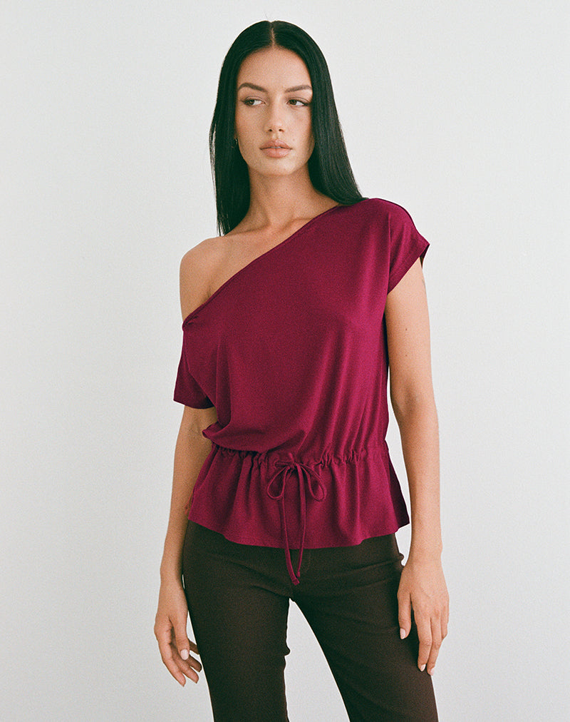 Image of Sika One Shoulder Top in Burgundy with Tie Belt
